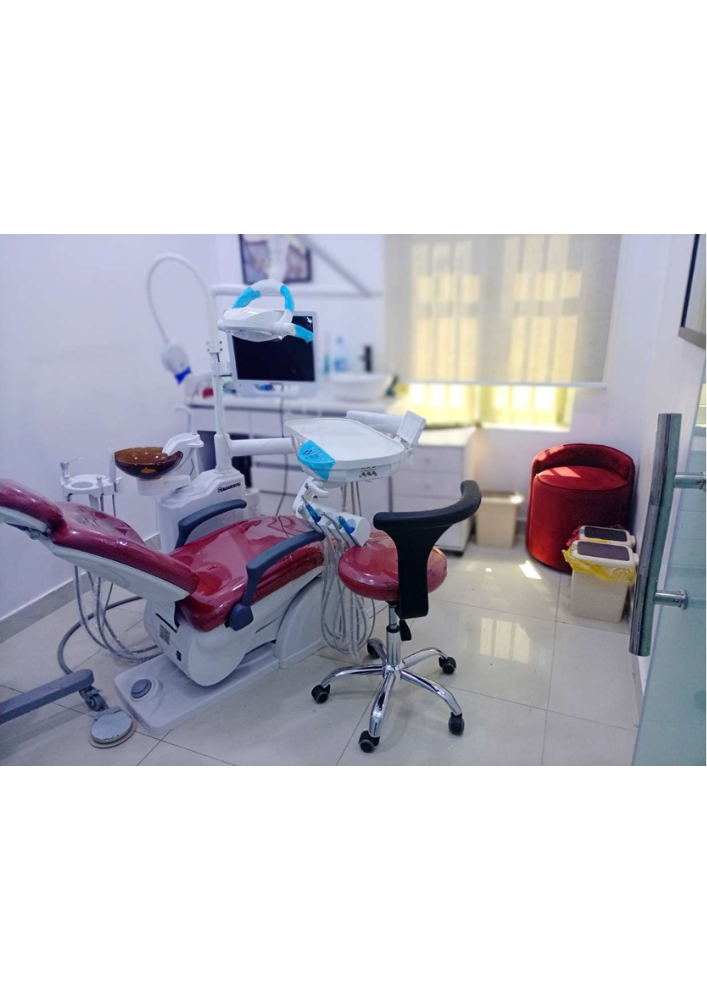 Red dental treatment room at OralFix Dental Clinic